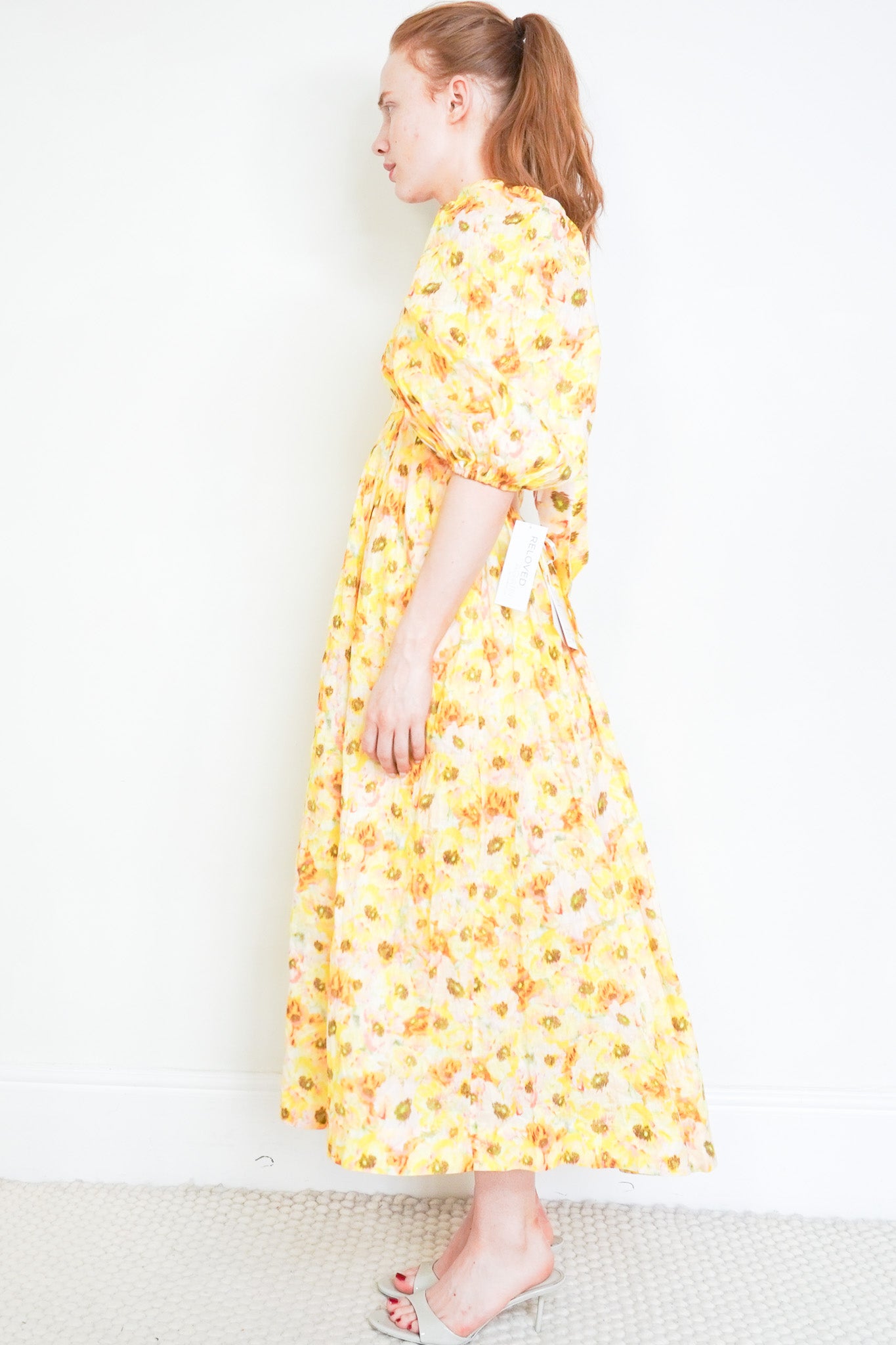 Side image of the Zimmermann Open Back Yellow Dress
