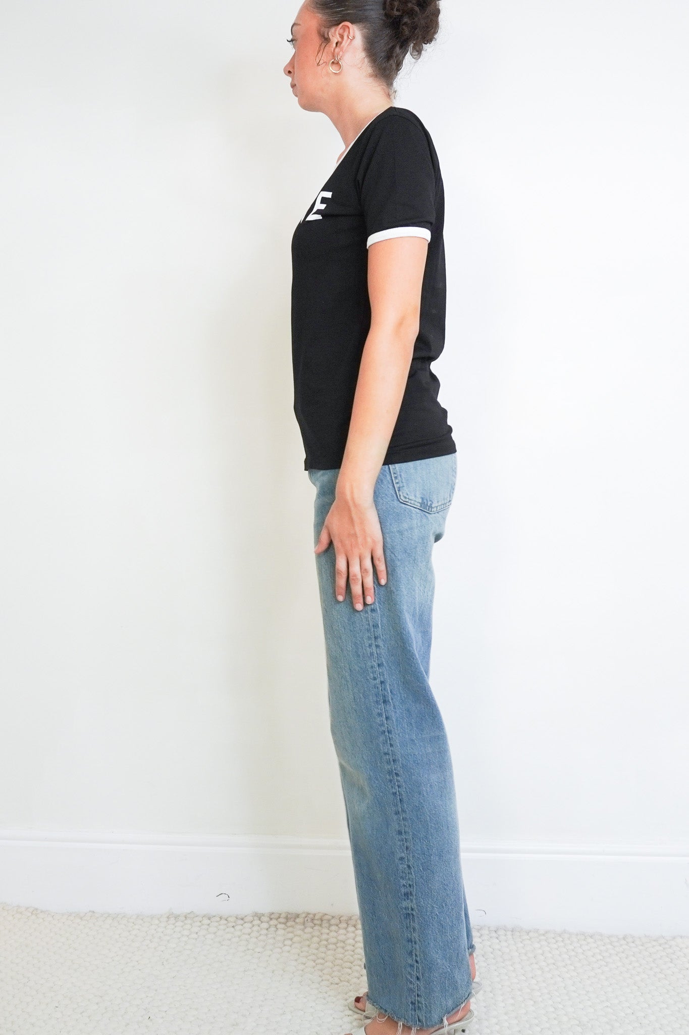 Side photo of the Celine Black Logo T-Shirt 