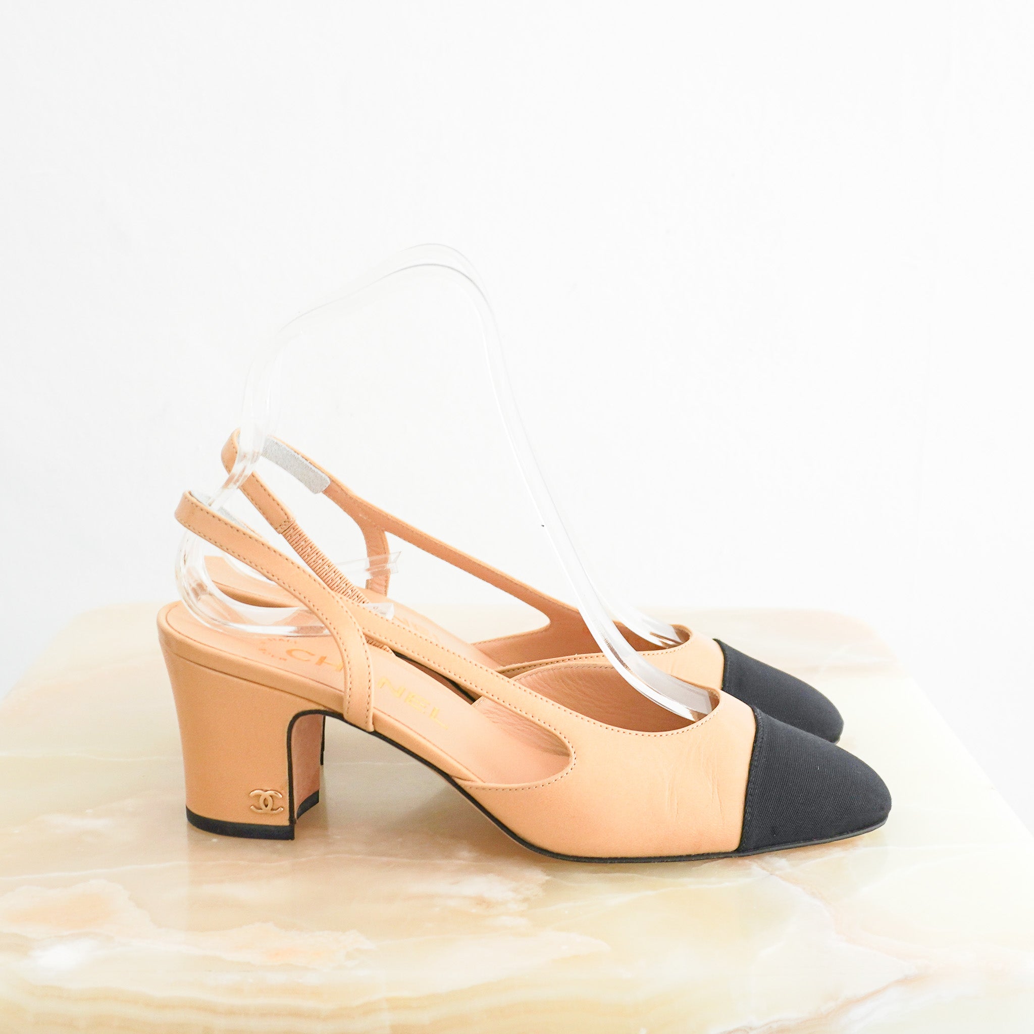 Side photo of the Chanel Two Tone Slingbacks