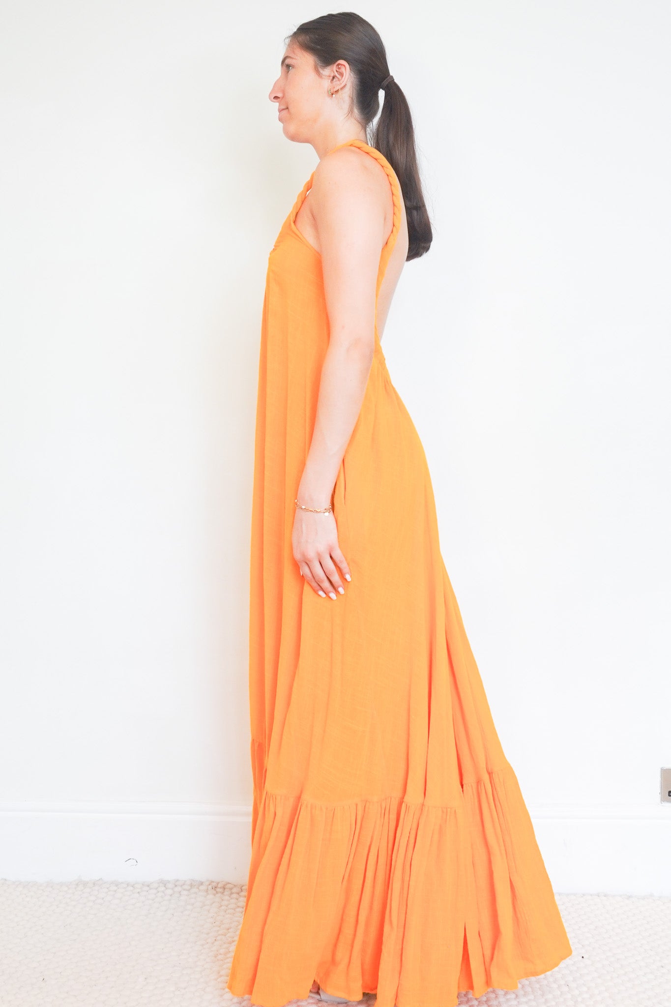Side photo of the Kalita Orange Dress 