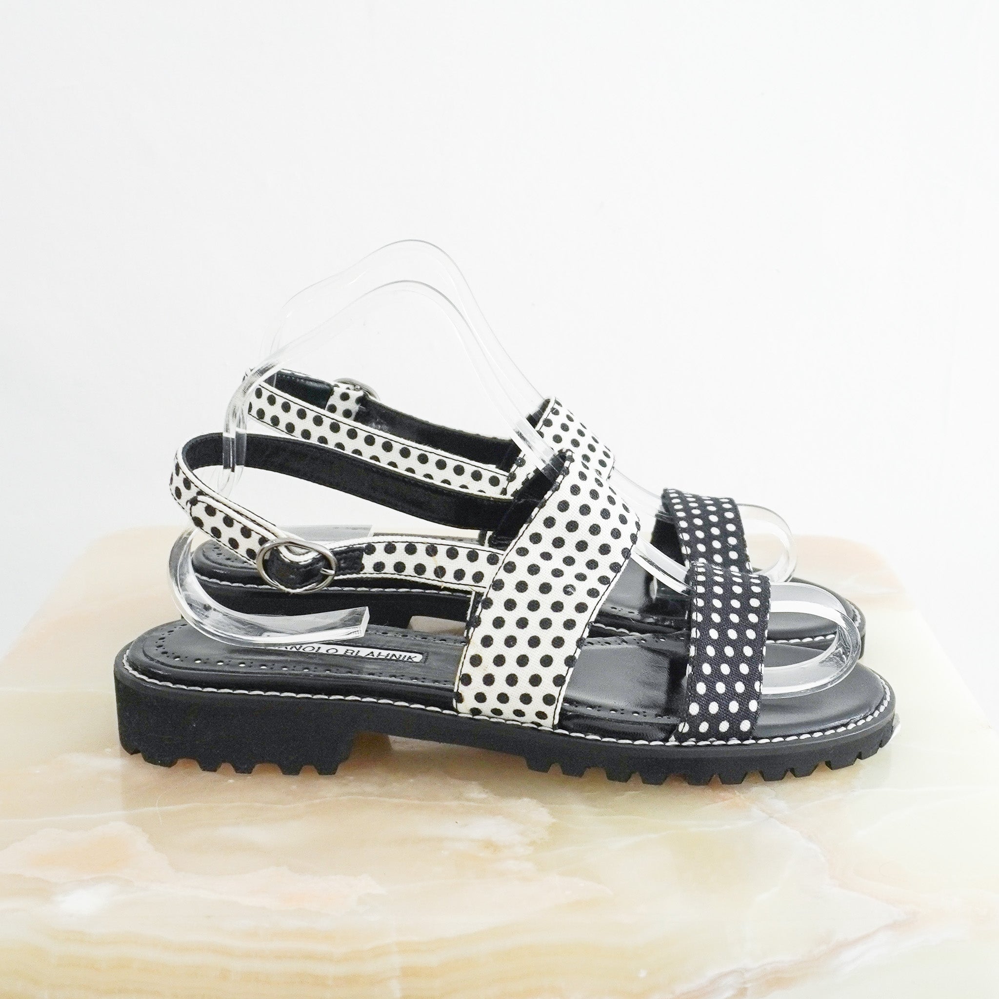 Side photo of the Manolo Blahnik Polka Dot Flat Sandals