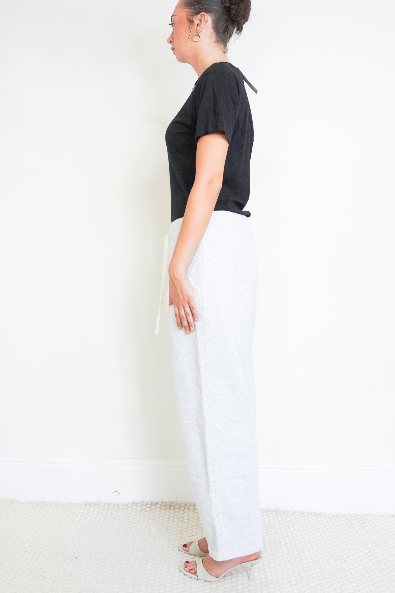 Side photo of the Navy Grey Joggers in grey