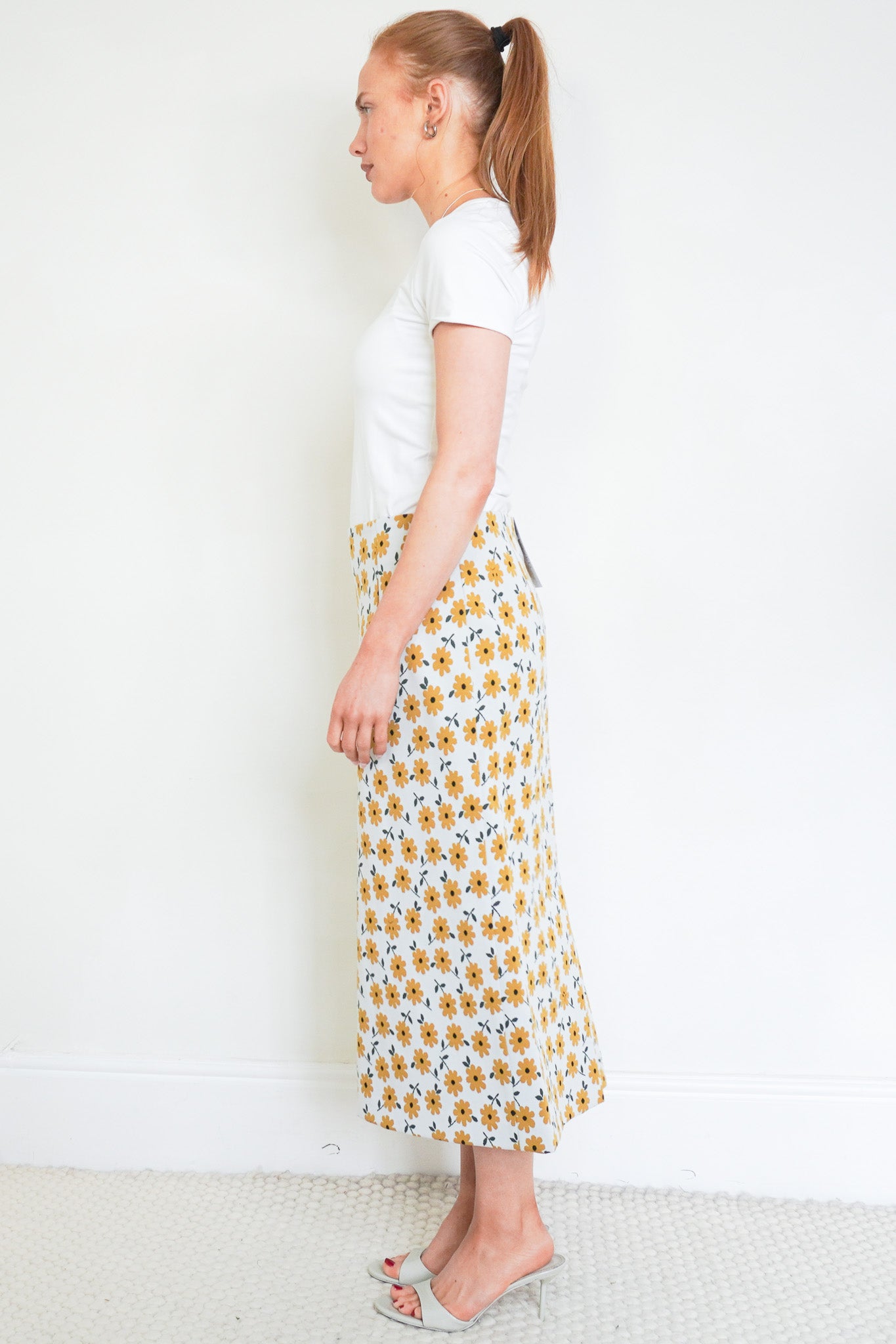 Side photo of the Tibi Floral Midi Skirt