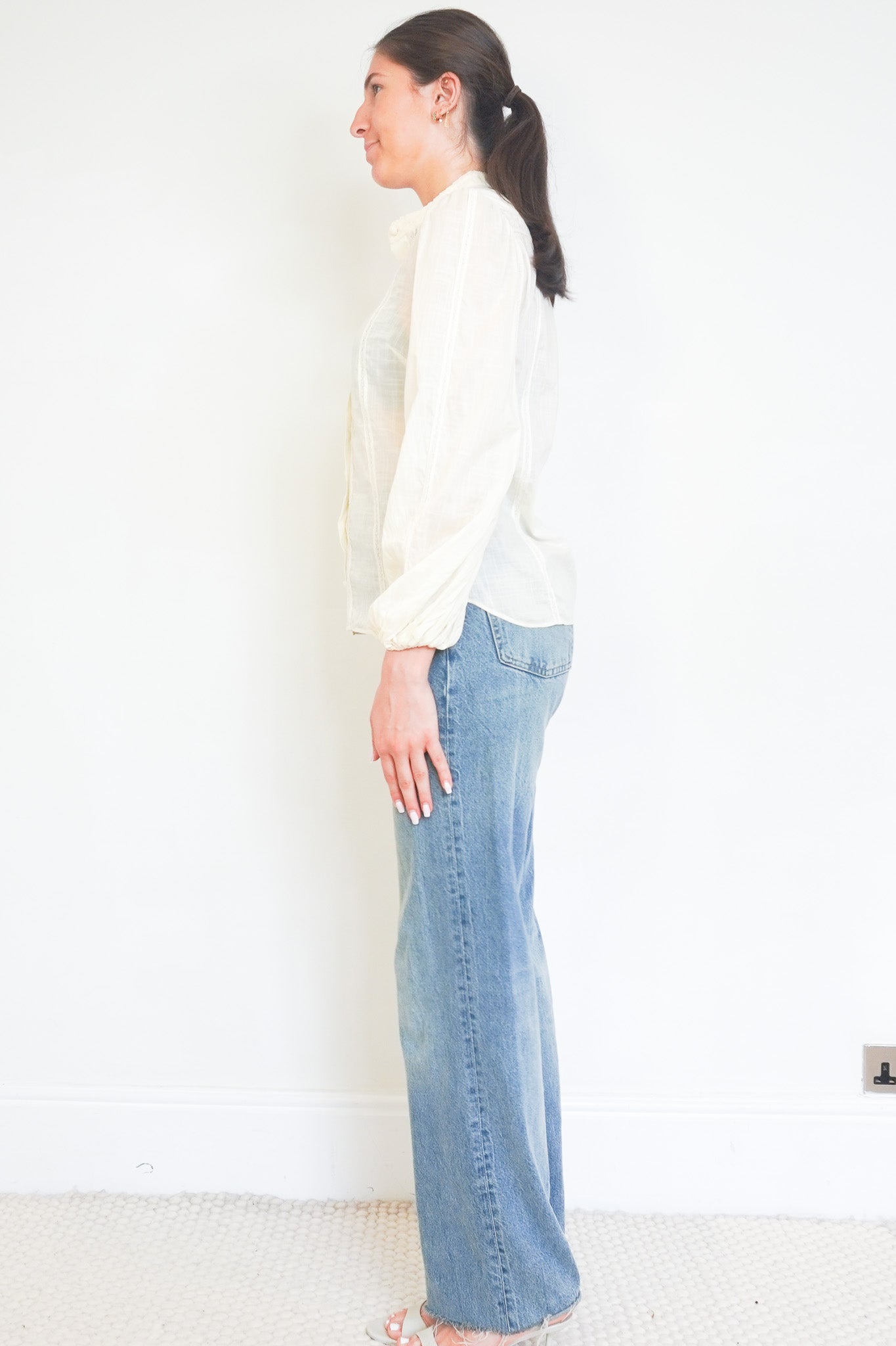 Side photo of the Zimmermann Cream Lace Blouse 