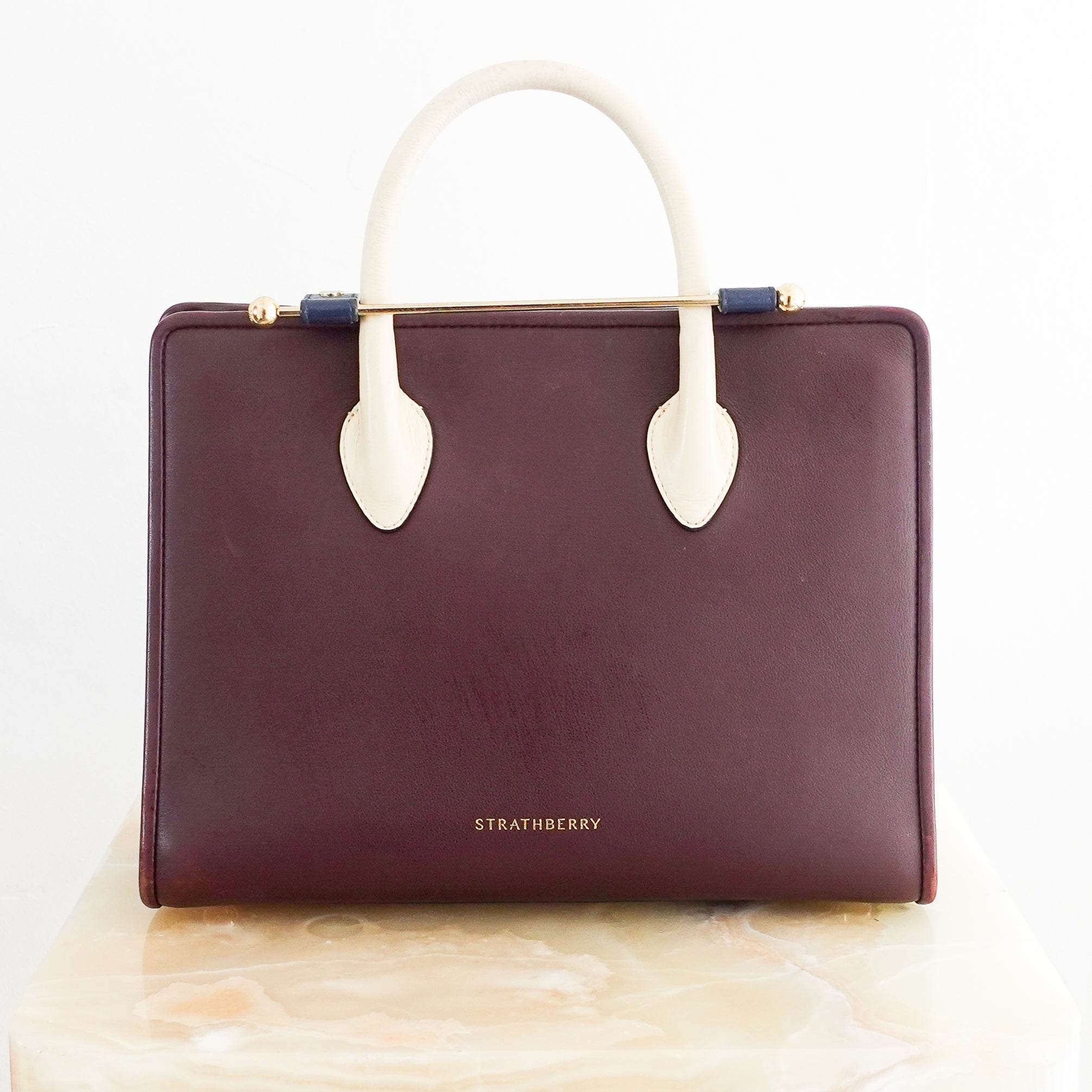 Strathberry-Burgundy-Vanilla-Midi-Tote-with-Asymmetrical-Handles-head-on-picture