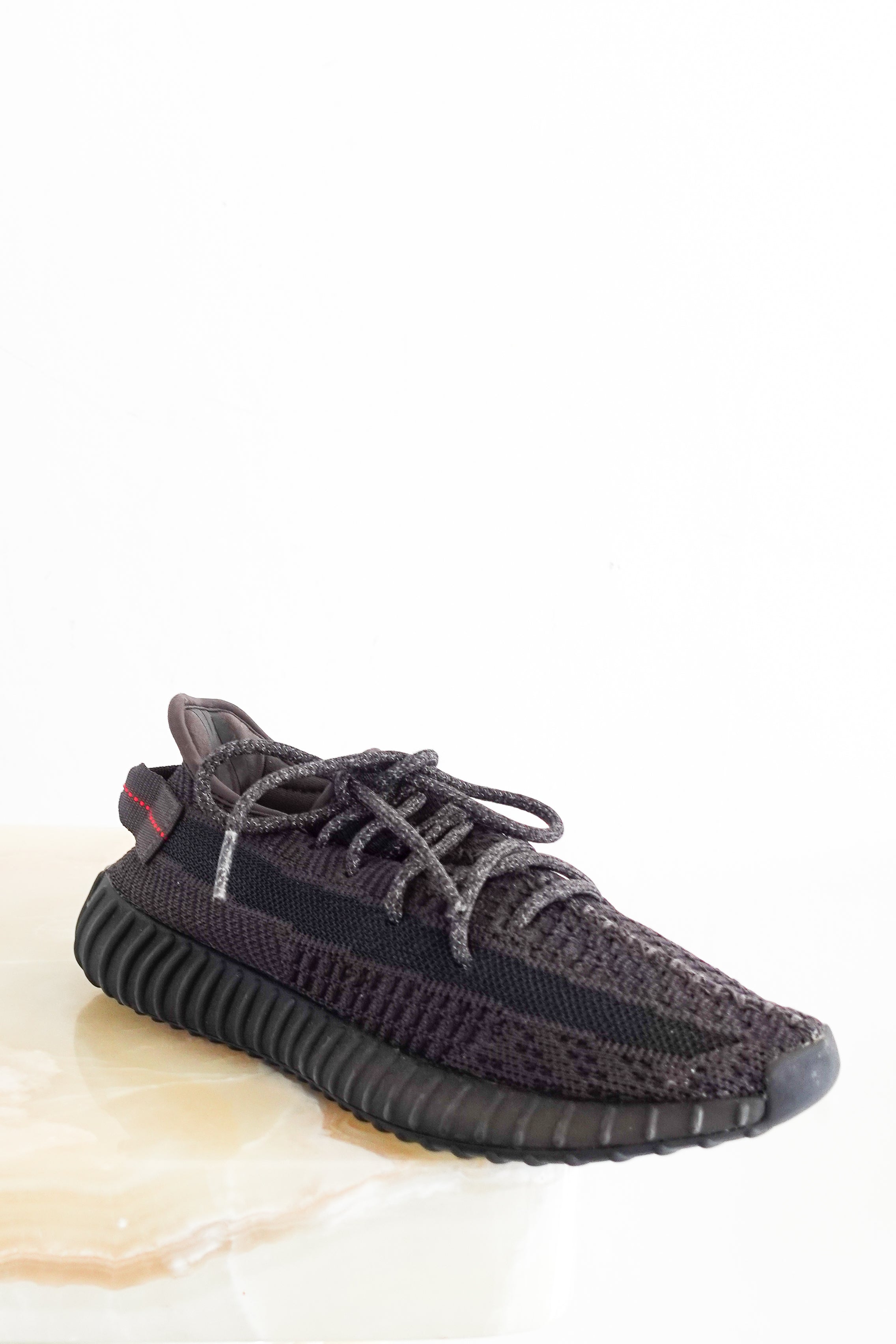 Yeezy trainers in black knit fabric