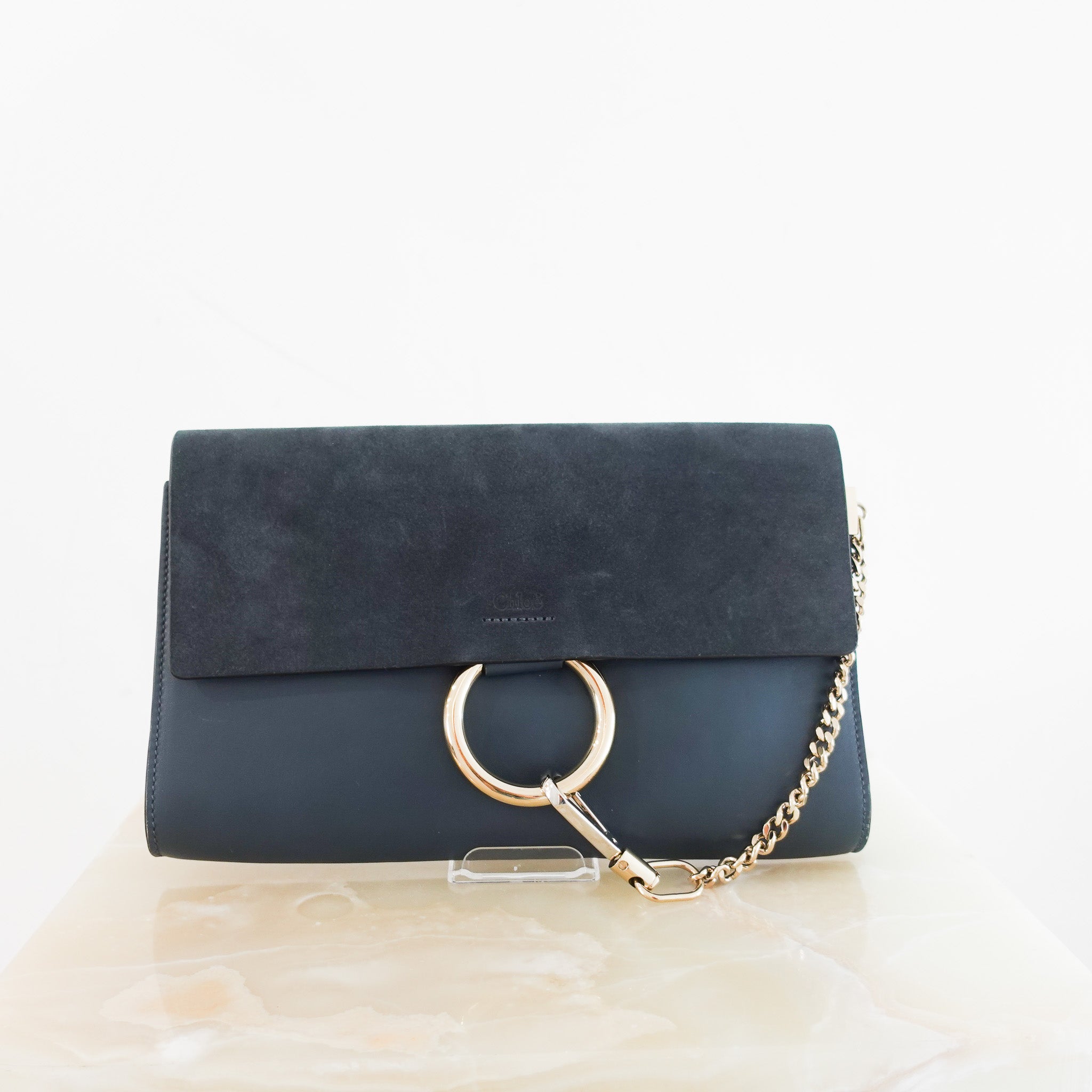 chloe-faye-suede-clutch-in-blue-front-picture-chelsea-london