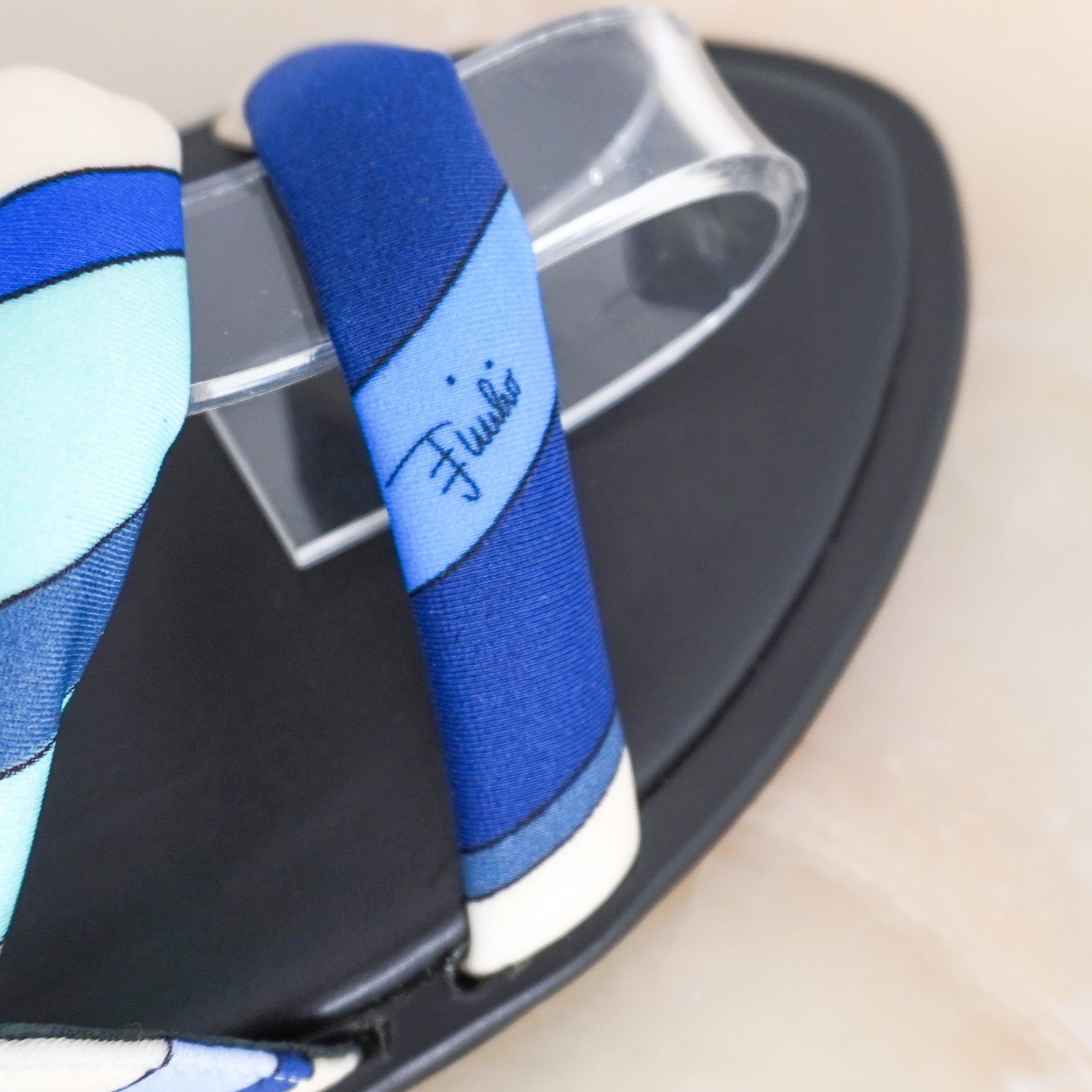 Close up image of the Emilio Pucci Sandals showing the branding.
