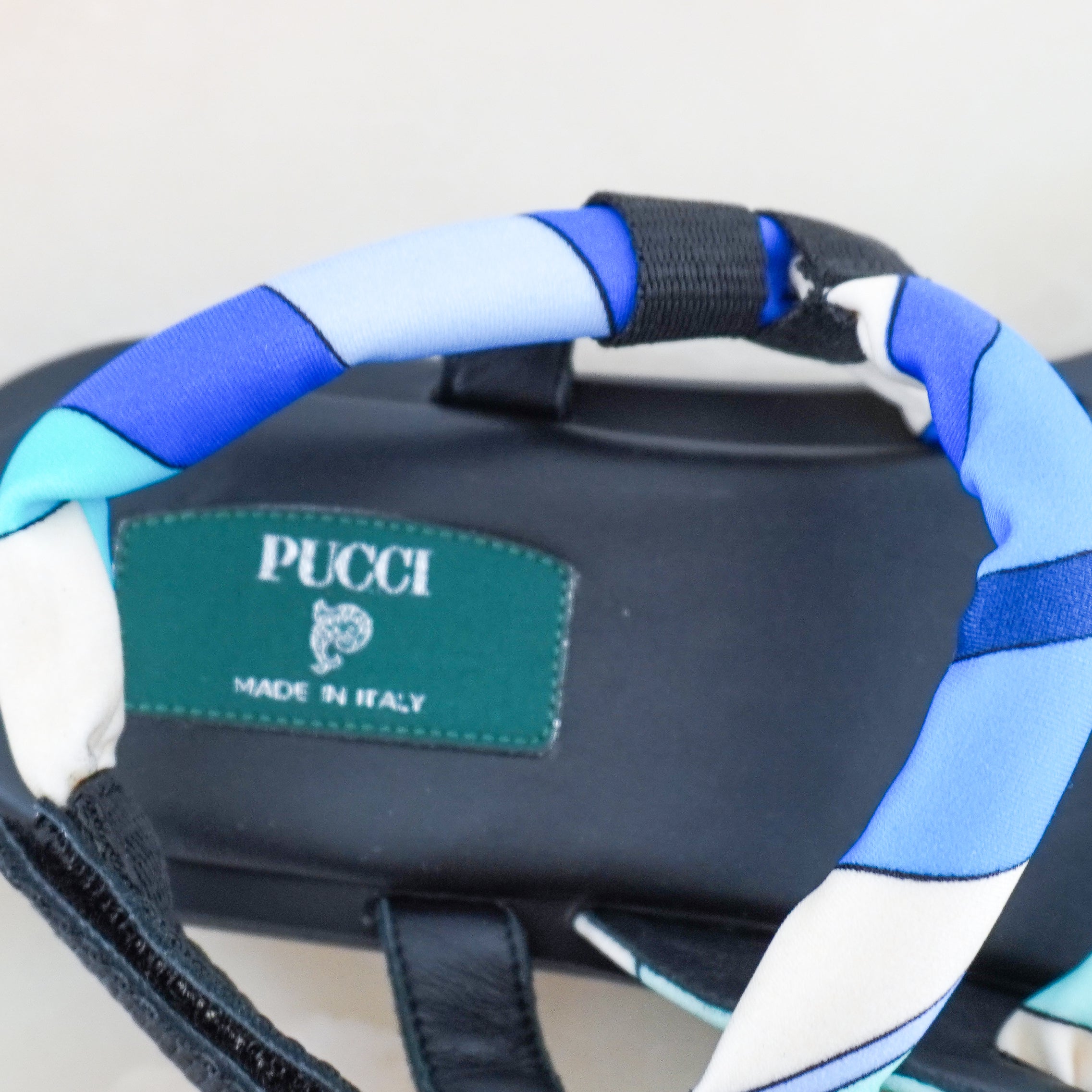 Logo image of the Emilio Pucci Sandals showing the tag.