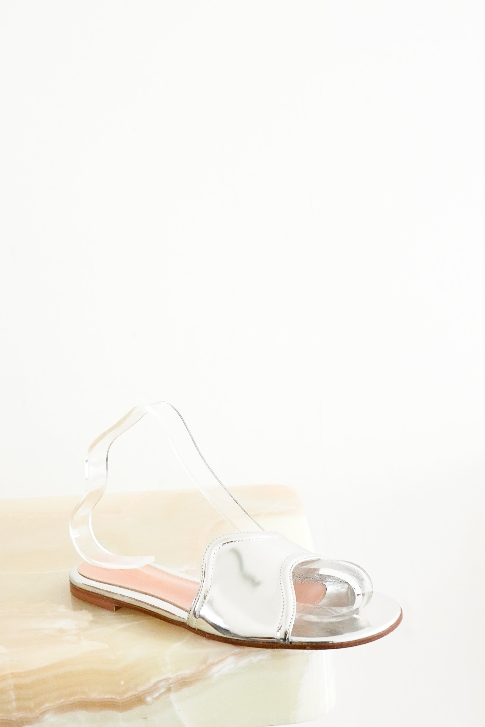 Front image of the Gianvito Rossi mules, showing the strap.