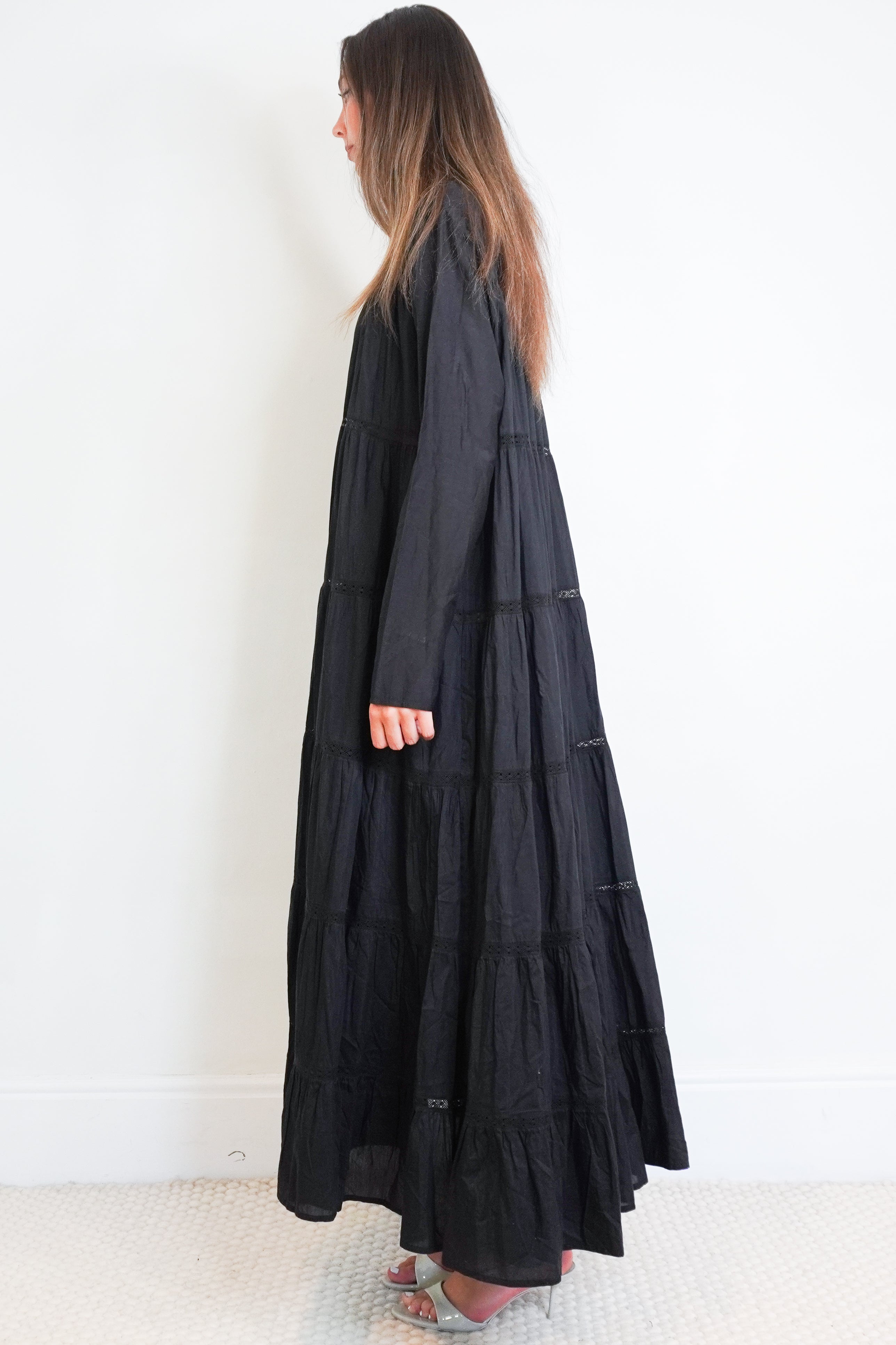 Side image of the Merlette Black Dress