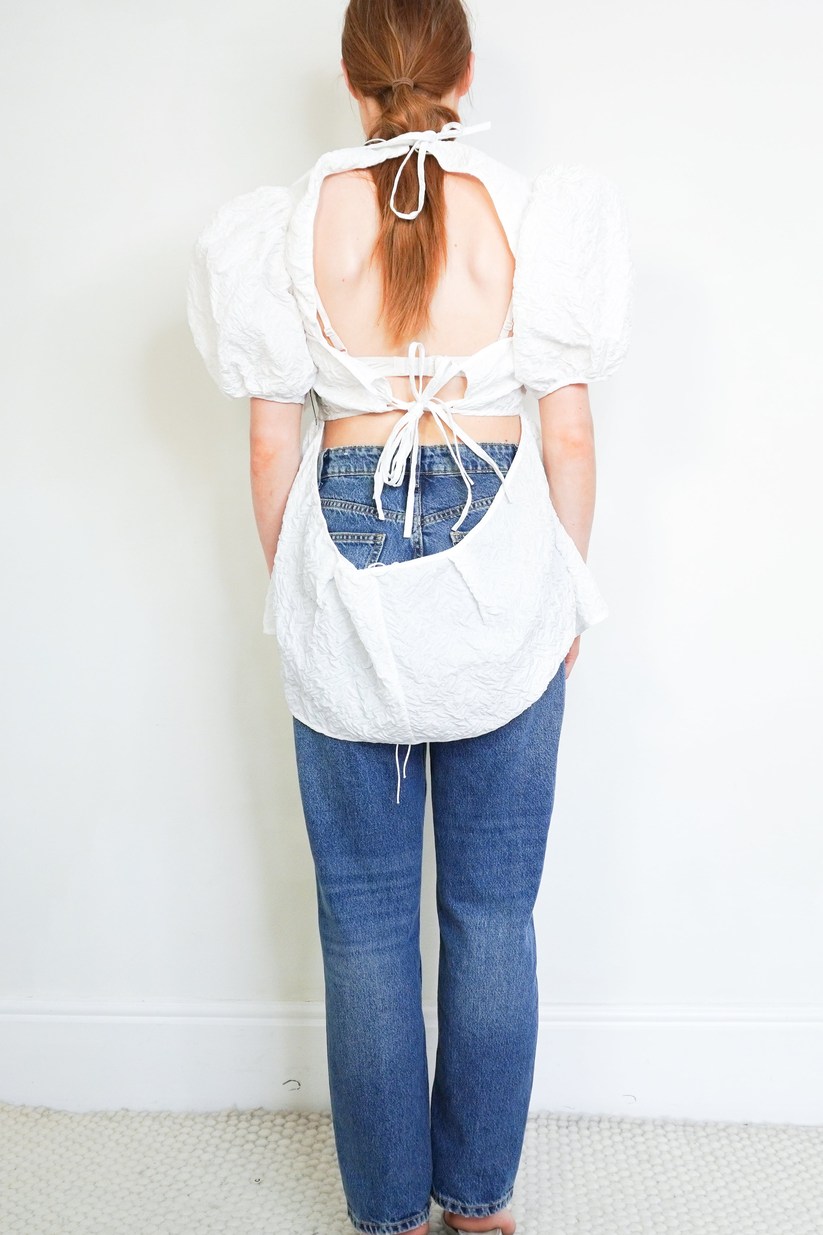 Back image of the Cecile Bahnsen Top backless the silhouette.