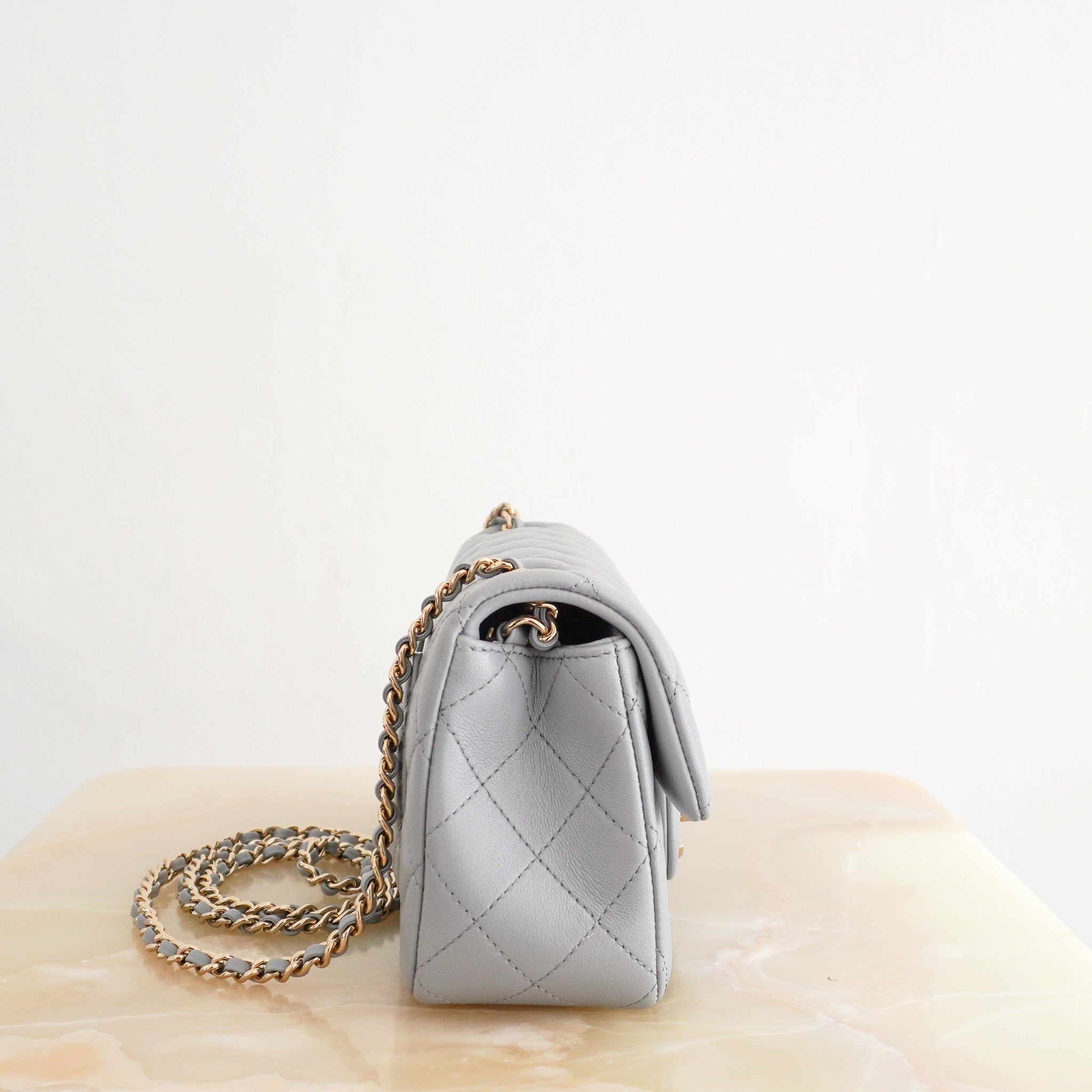 side image of the NEW Chanel Mini Sac Rabat Flap Bag in Pearl Crush 