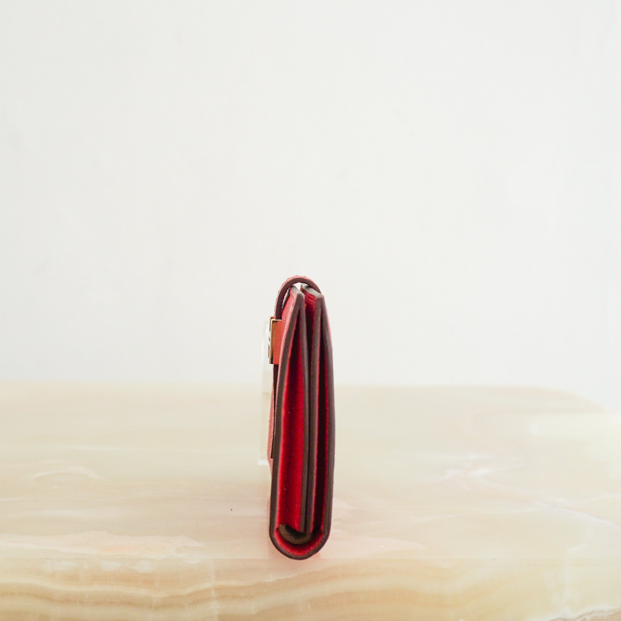 side image of the NEW Hermes Bearn Card Holder in Red