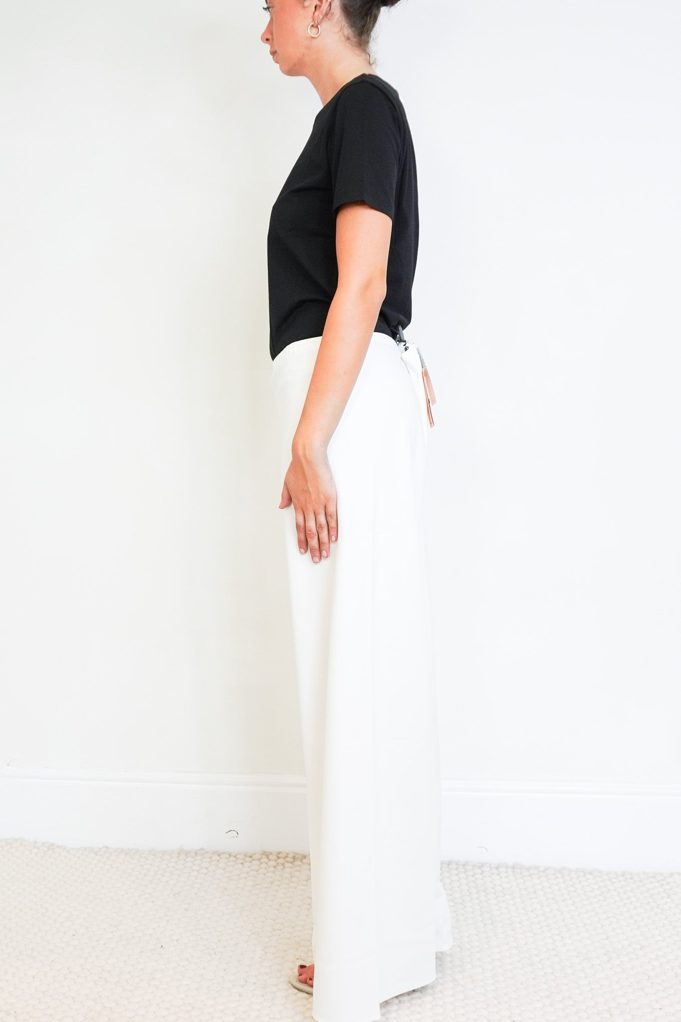 side images of the NEW La Ligne White Trousers 