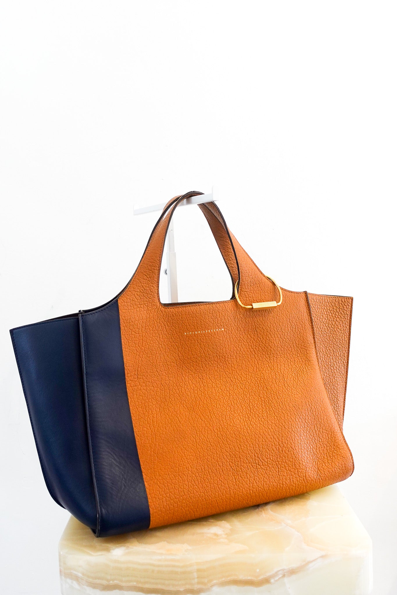 victoria-beckham-navy-and-brown-leather-tote-cover-picture-chelsea-london